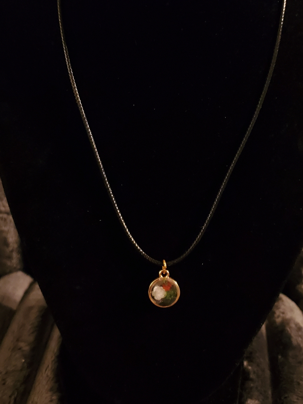 Handcrafted Gold Round Pendant Necklace with Green and Red Accent on Black Cord